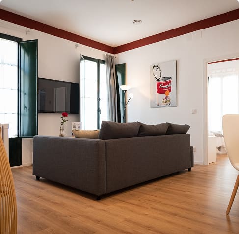 Hoteles del Sur | Suite Salón del Apartamento Suite, con suelos de parquet y balcones exteriores