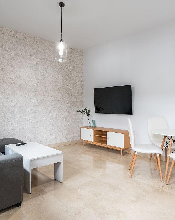 Living room in one of Hoteles del Sur’s apartments in Seville