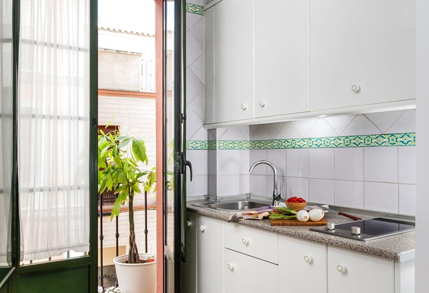 Apartamento Superior | Cozinha exterior Cozinha com saída direta para um agradável balcão