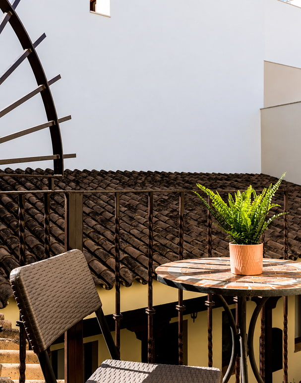 Apartamento com Terraço Primeiro plano do mobiliário exterior de um apartamento com terraço